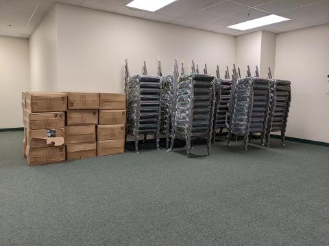 Chairs delivered and ready to be set up.